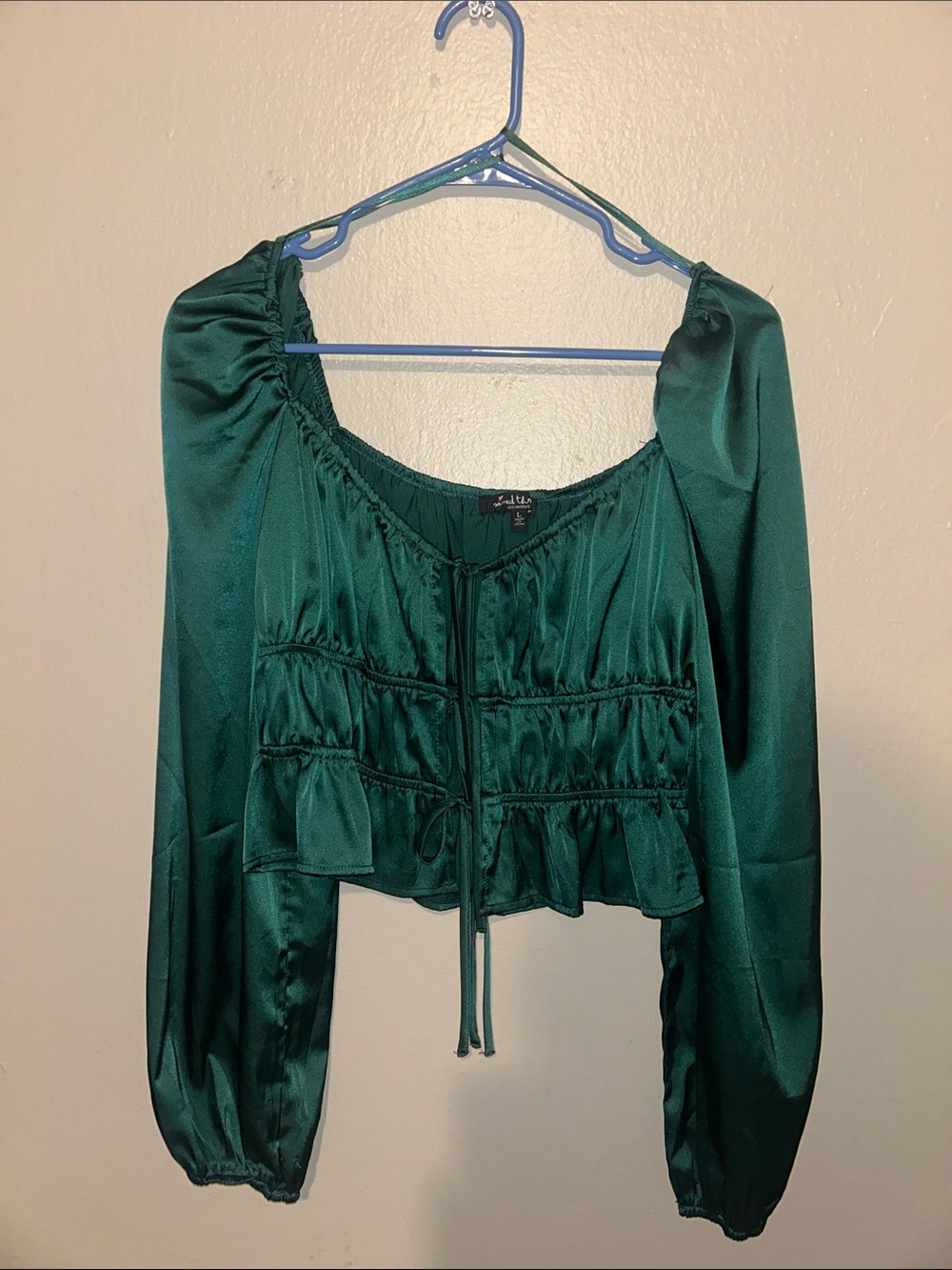 Teal green long sleeve top